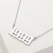 White Gold Dipped 1999 Birth Year Plate Pendant Necklace