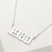 White Gold Dipped 1980 Birth Year Plate Pendant Necklace