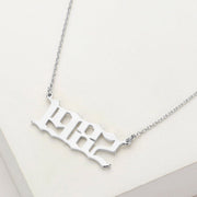 White Gold Dipped 1982 Birth Year Plate Pendant Necklace