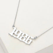 White Gold Dipped 1986 Birth Year Plate Pendant Necklace