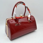 Glossy Patent Leather Barrel Handbag with Scarf-Wrapped Handle