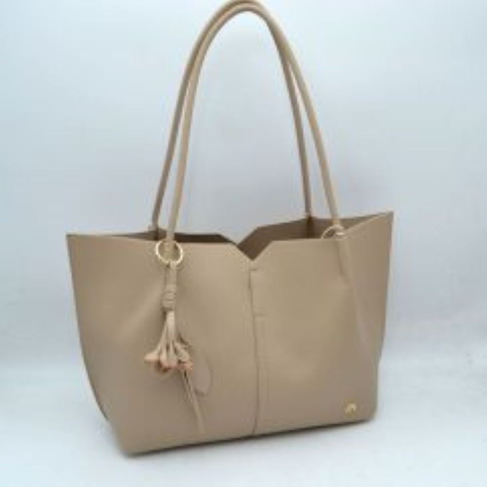 Minimalist Structured Tote Bag with Geometric Cutout and Tassel Accent