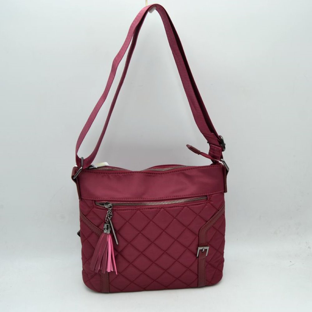 Quilted Nylon Crossbody Bag with Buckle Accents and Tassel Charm