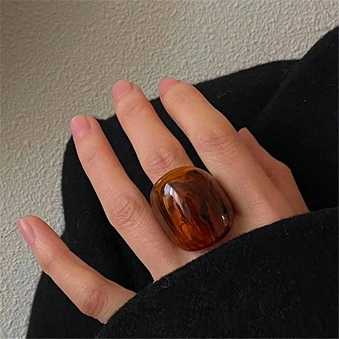 AMBER-BROWN RESIN STATEMENT RING