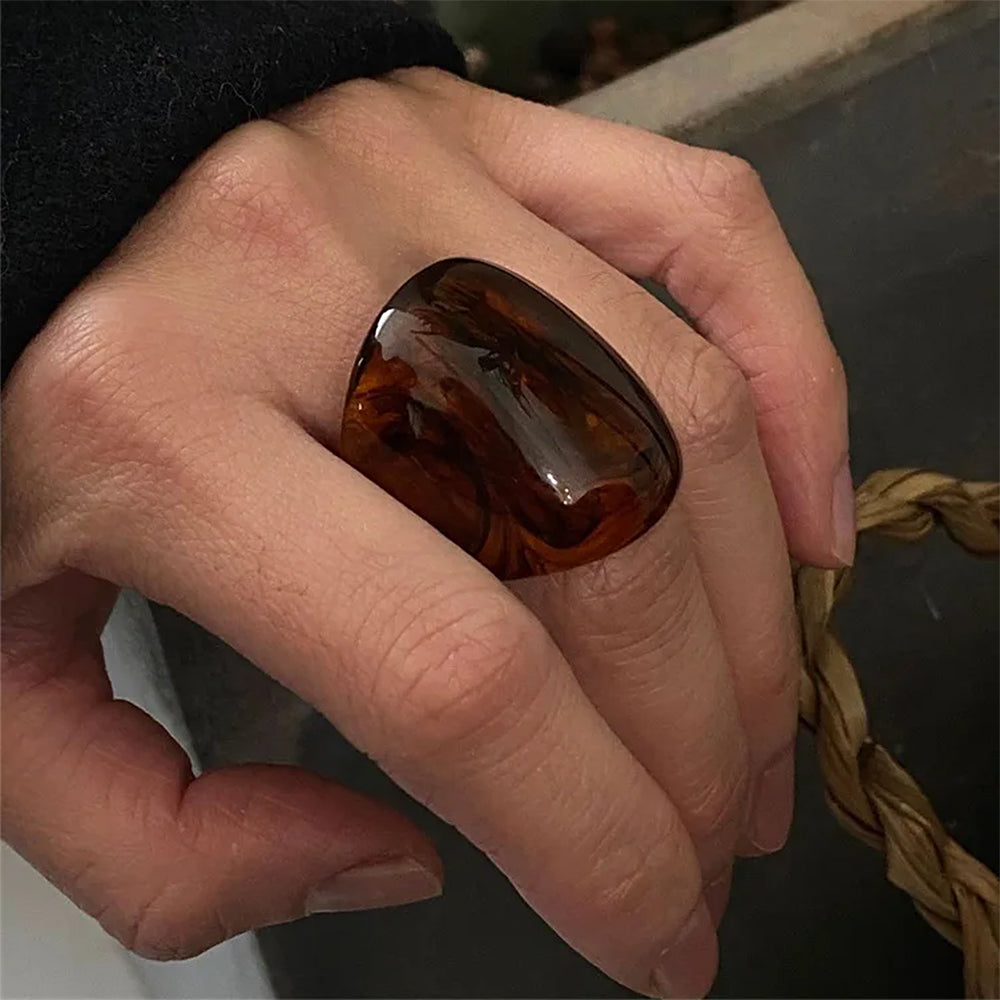 AMBER-BROWN RESIN STATEMENT RING