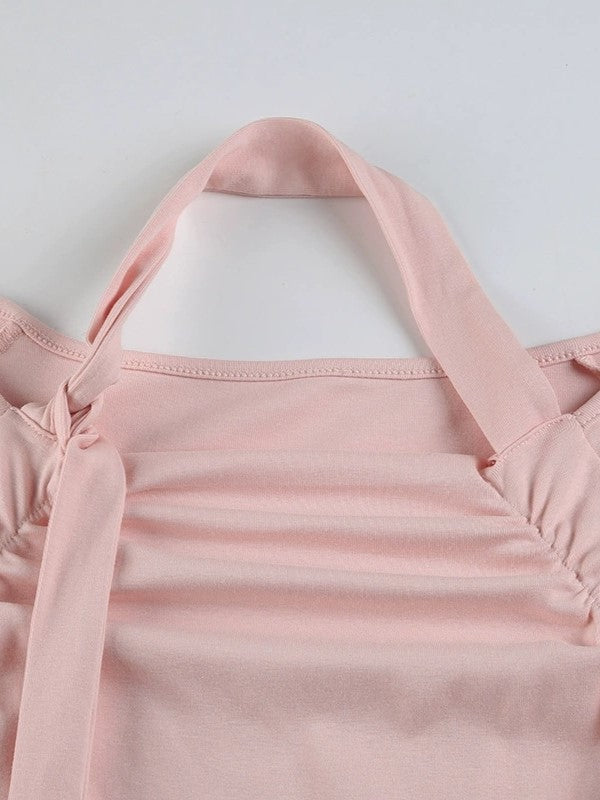 ASYMMETRICAL LONG-SLEEVED TOP WITH HALTER NECK TIE RUFFLE