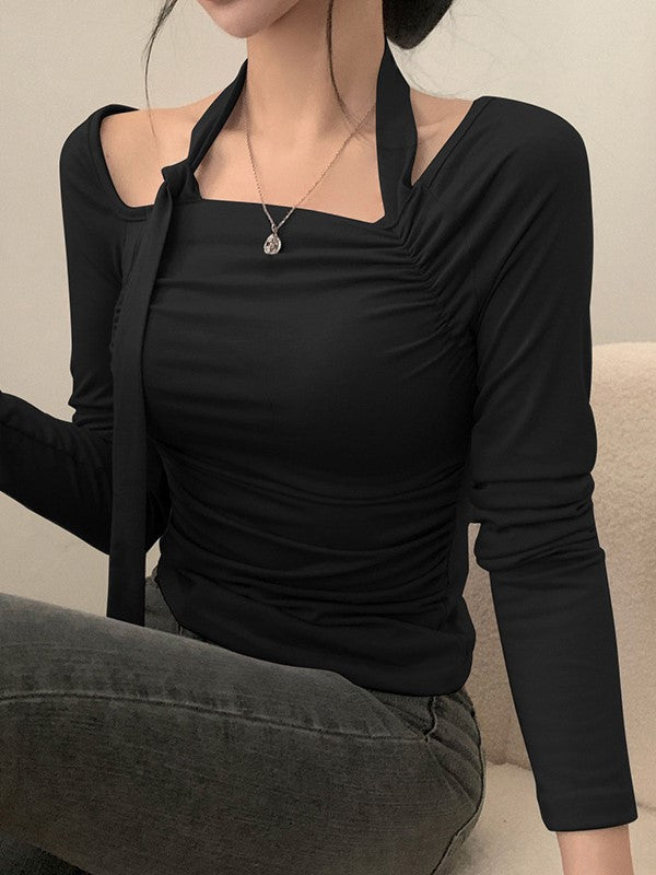 ASYMMETRICAL LONG-SLEEVED TOP WITH HALTER NECK TIE RUFFLE