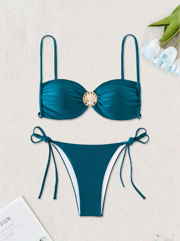 Teal backless metal pin bikini with seashell detailing perfect for beachwear