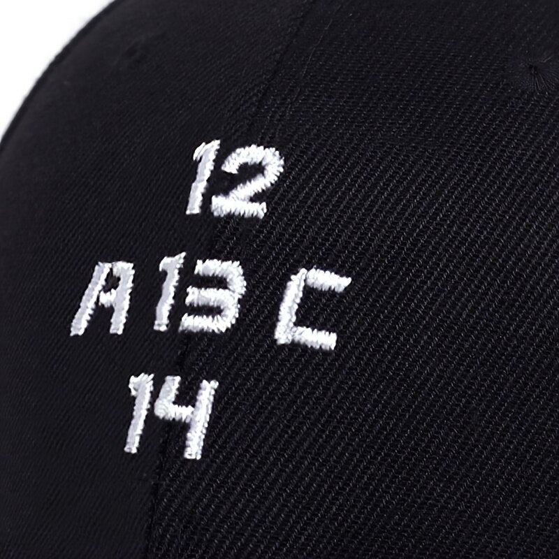 BLACK BASEBALL CAP WITH EMBROIDERED DESIGN AND ADJUSTABLE STRAP