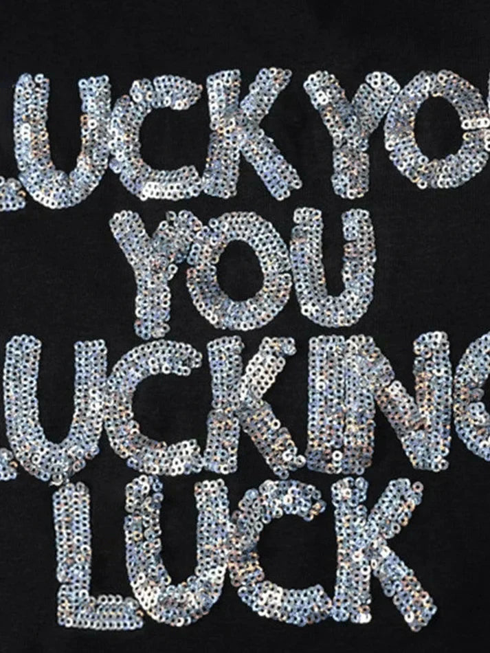 BLACK CROP TOP WITH OFFENSIVE TEXT AND SPARKLING SEQUIN DETAIL