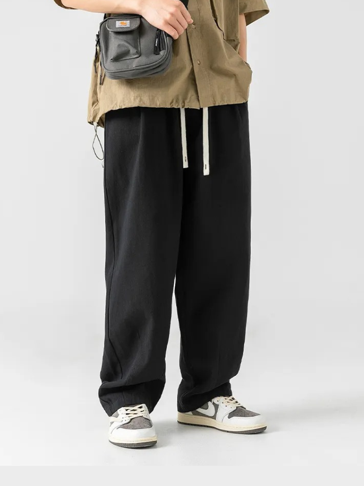 BLACK DRAWSTRING SWEATPANTS FOR MEN AND WOMEN COMFORT AND VERSATILITY