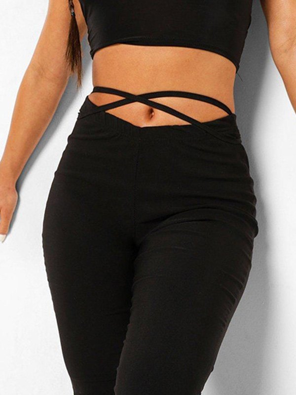 BLACK FLARED TROUSERS WITH CRISSCROSS WAIST - BLACK FLARED TROUSERS