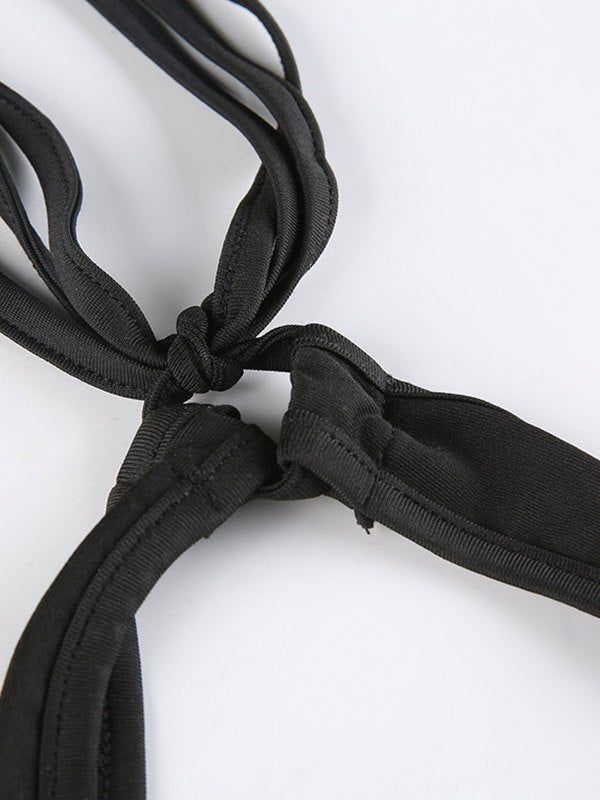 BLACK HALTER TOP WITH FLATTERING FIT TO TURN HEADS