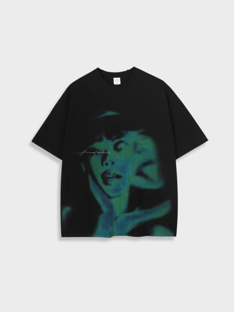 BLACK OVERSIZED DISTRESSED TEE WITH BLUE AND GREEN FACE GRAPHIC