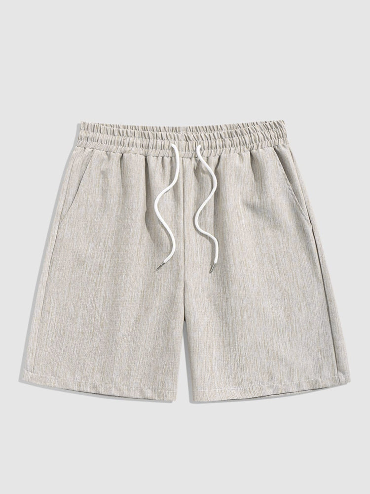 BLACK T-SHIRT AND BEIGE SHORTS SET FEATURING ICONIC LANDMARKS