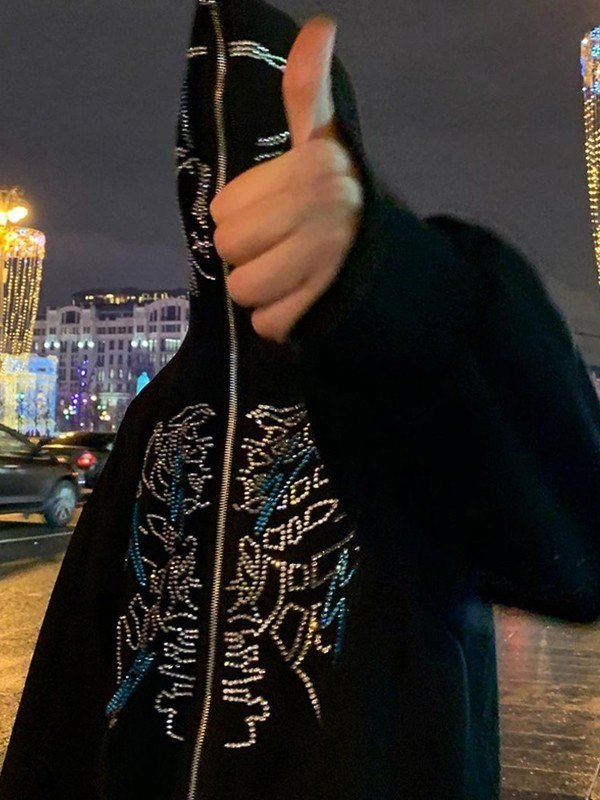 BLACK ZIP-UP HOODIE WITH FACE MOTIF AND GLITTERING RHINESTONES