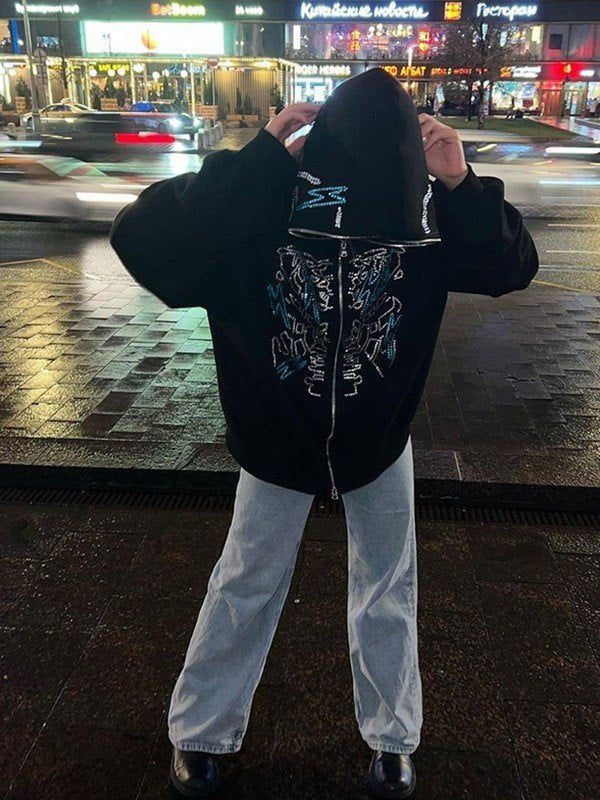 BLACK ZIP-UP HOODIE WITH FACE MOTIF AND GLITTERING RHINESTONES