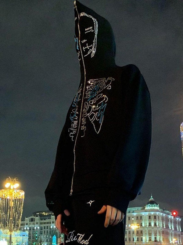 BLACK ZIP-UP HOODIE WITH FACE MOTIF AND GLITTERING RHINESTONES