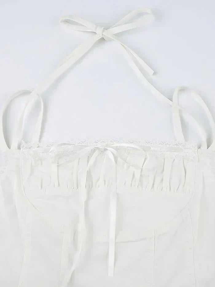 CORSET-STYLE TOP WITH RUFFLE BUST AND WHITE CUTE LACE DETAILS