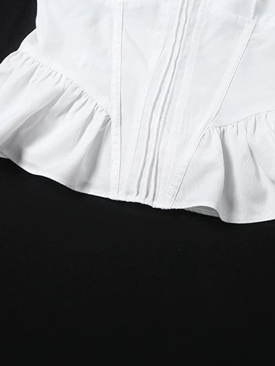 CORSET-STYLE TOP WITH TIE STRAPS AND BOW TIE CAMI DETAIL
