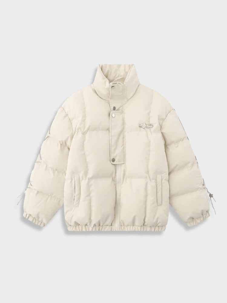 BLACK PUFFER JACKET WITH WHITE ACCENTS FOR COLD WEATHER WEAR