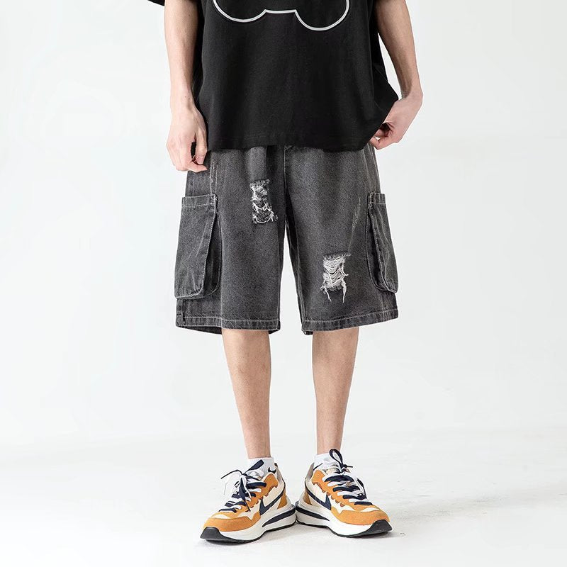 DISTRESSED DENIM CARGO SHORTS WITH ASYMMETRIC HOLE DESIGN