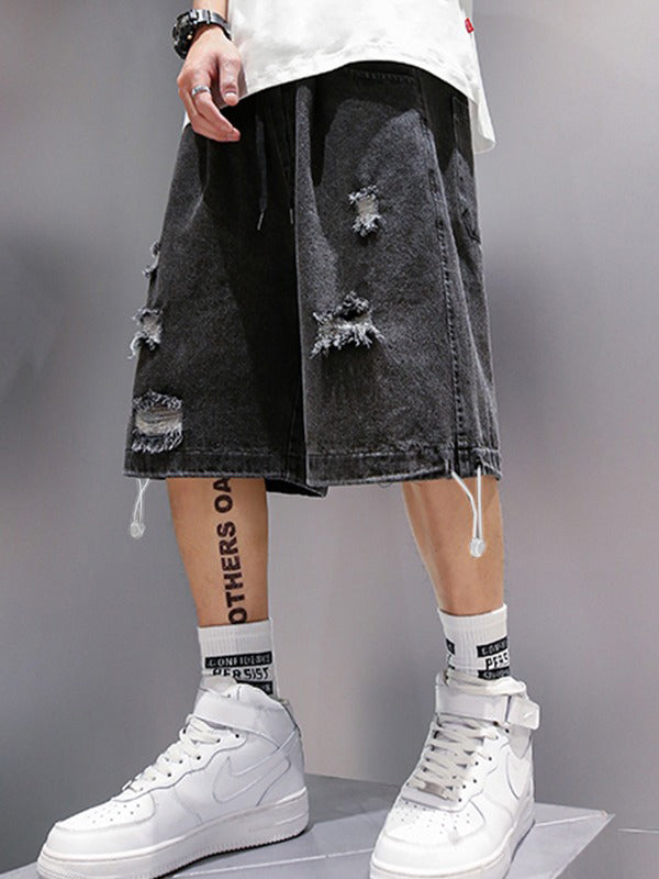 DISTRESSED DENIM SHORTS FOR SKATING SESSIONS