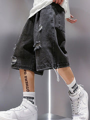 DISTRESSED DENIM SHORTS FOR SKATING SESSIONS