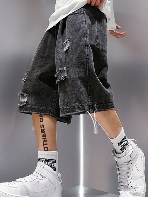 DISTRESSED DENIM SHORTS FOR SKATING SESSIONS