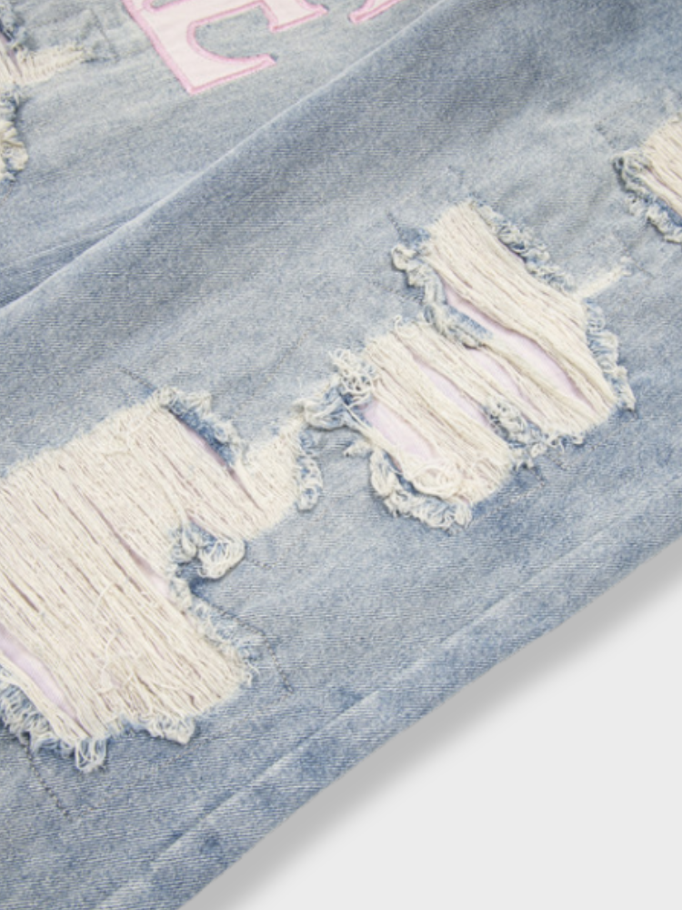 DISTRESSED LIGHT BLUE JEANS WITH SIZE CHART FOR EXPERT FIT GUIDANCE