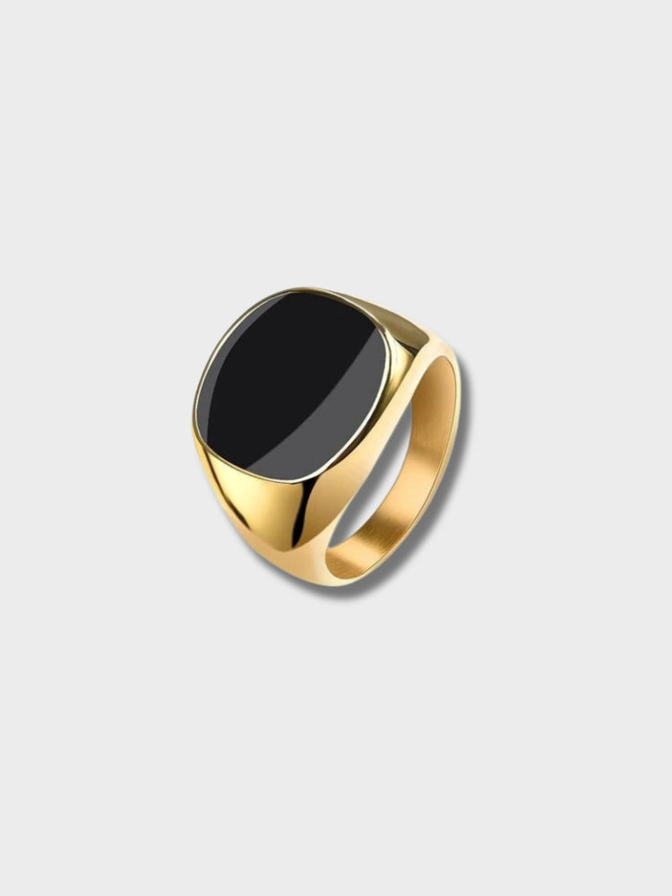 GOLD RING WITH BLACK STONE ROUND EDGE DESIGN