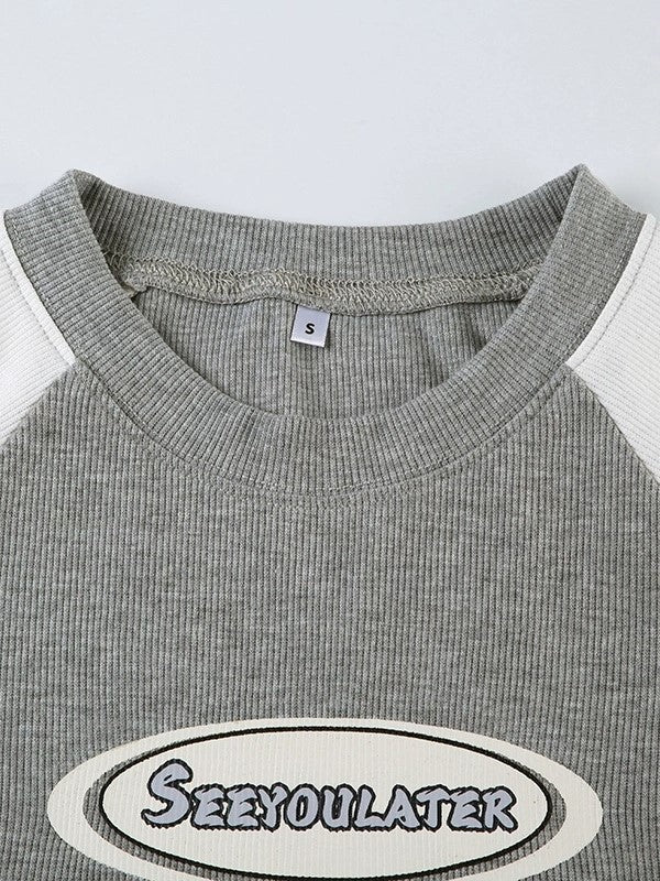 GRAY AND WHITE CROP TOP WITH RAGLAN SLEEVES AND BOLD CONTRAST