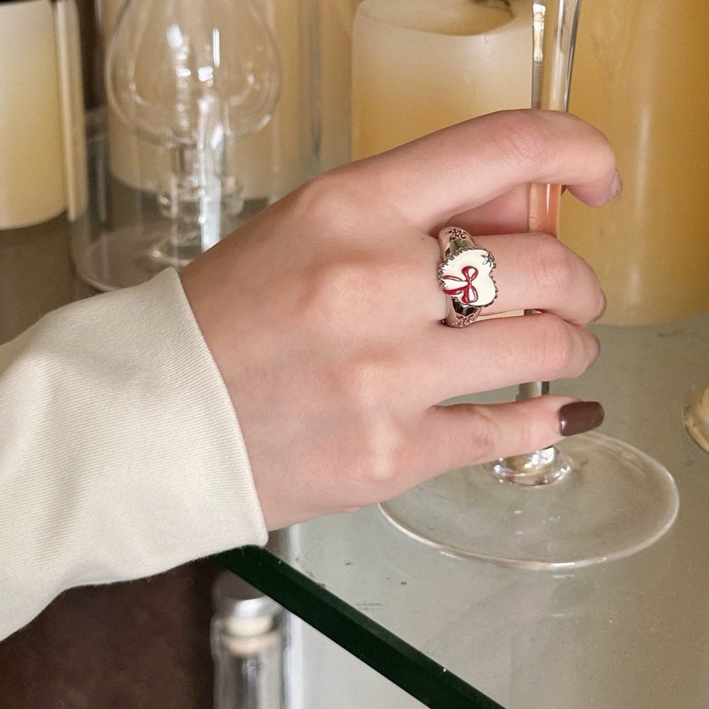 HEART AND BOW SILVER RING WITH RED BOW