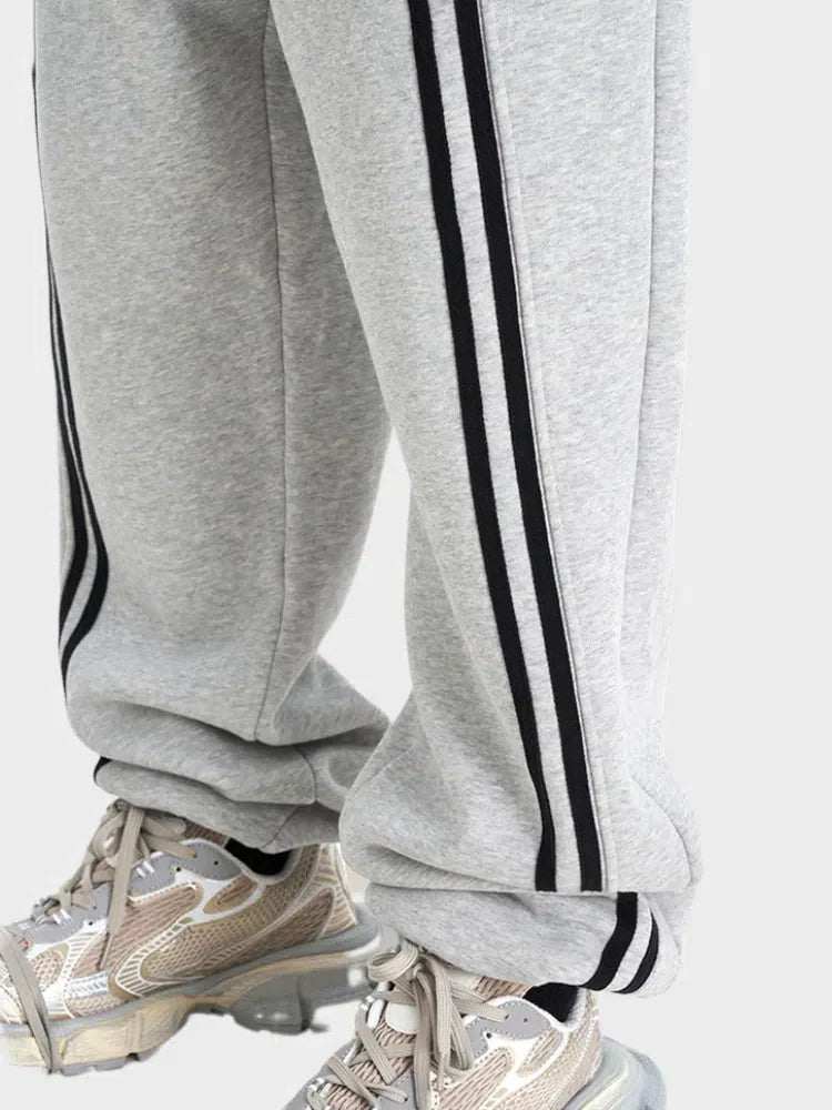 GRAY LOOSE FIT JOGGERS WITH BLACK STRIPES