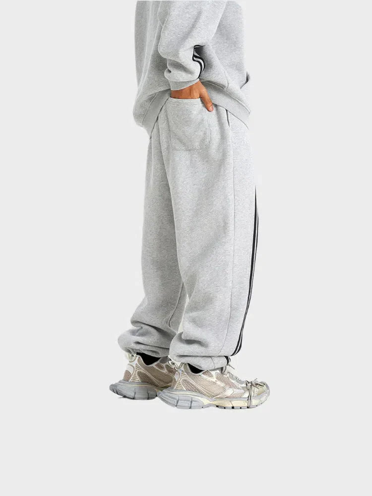 GRAY LOOSE FIT JOGGERS WITH BLACK STRIPES