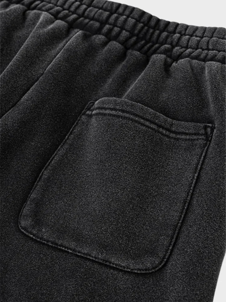 GRAY LOOSE FIT JOGGERS WITH BLACK STRIPES
