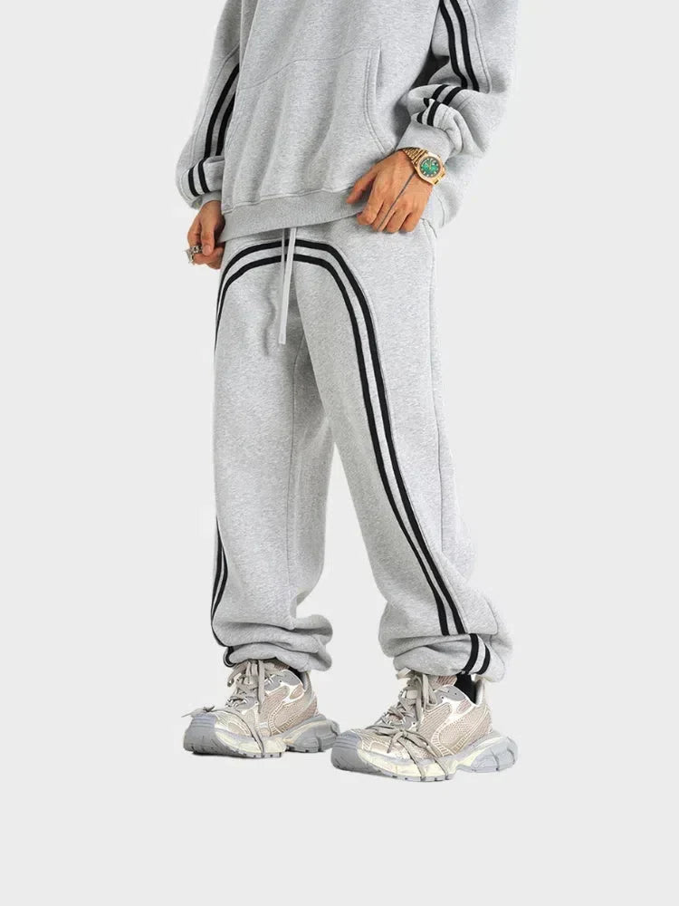 GRAY LOOSE FIT JOGGERS WITH BLACK STRIPES