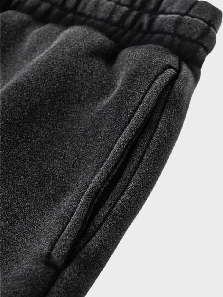 GRAY LOOSE FIT JOGGERS WITH BLACK STRIPES