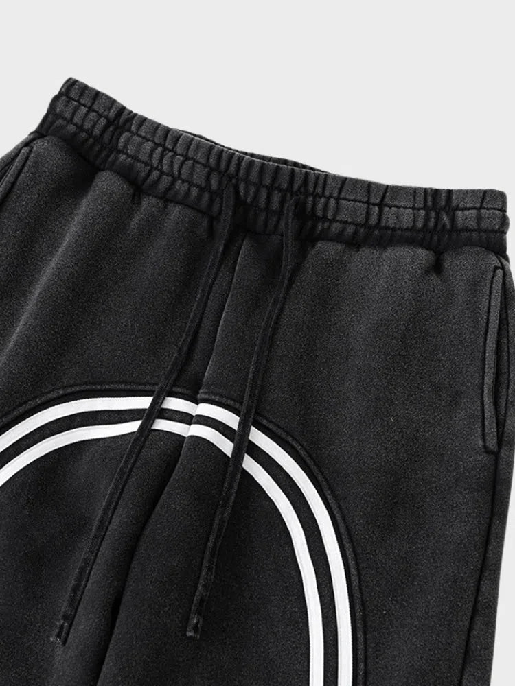 GRAY LOOSE FIT JOGGERS WITH BLACK STRIPES
