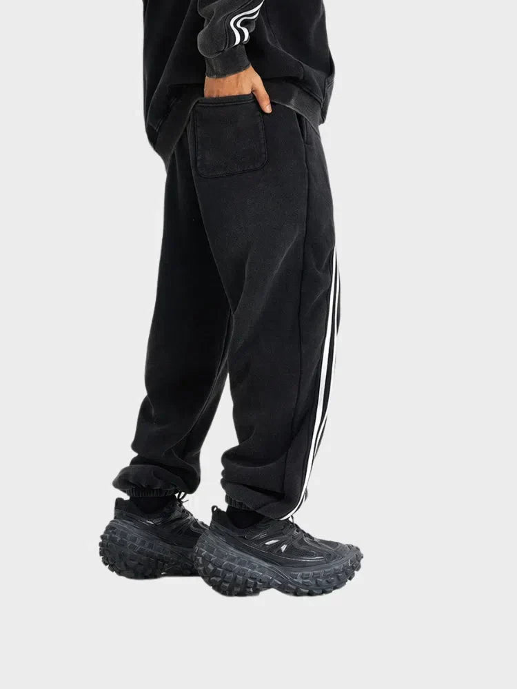 GRAY LOOSE FIT JOGGERS WITH BLACK STRIPES