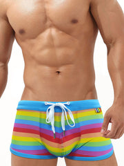Men's Rainbow Swim Boxers – front view showing horizontal rainbow stripes