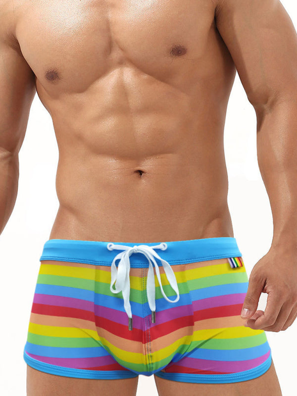 Men's Rainbow Swim Boxers – front view showing horizontal rainbow stripes
