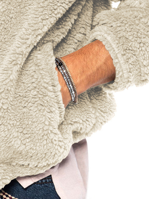 Textured fleece fabric close-up with zippered pocket