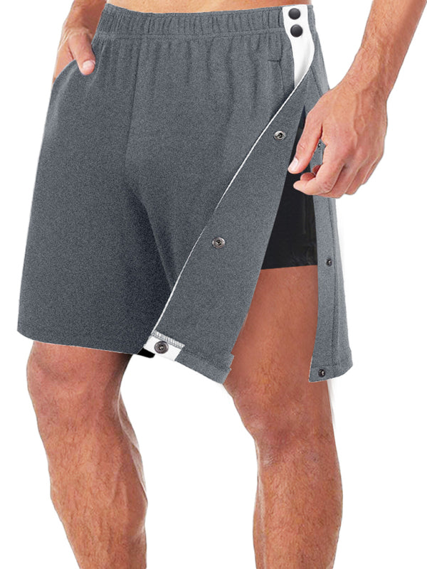 Short de sport décontracté et tendance pour homme, coupe ample, avec boutons sur toute la longueur des côtés 