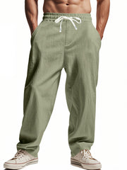 Loose linen cargo pants – sage green front view