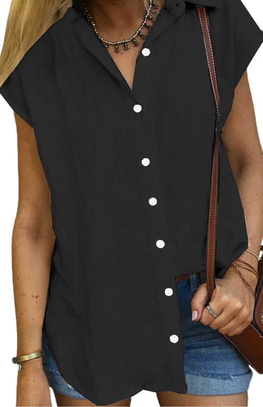 Leinenbluse mit Reverskragen, Knopfleiste, Raglanärmeln und abgerundetem Schlitz am Saum 