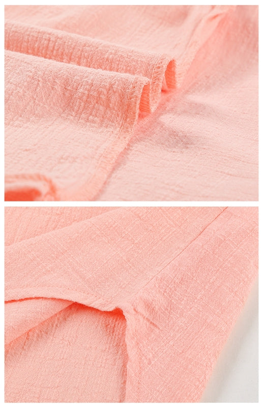 Leinenbluse mit Reverskragen, Knopfleiste, Raglanärmeln und abgerundetem Schlitz am Saum 