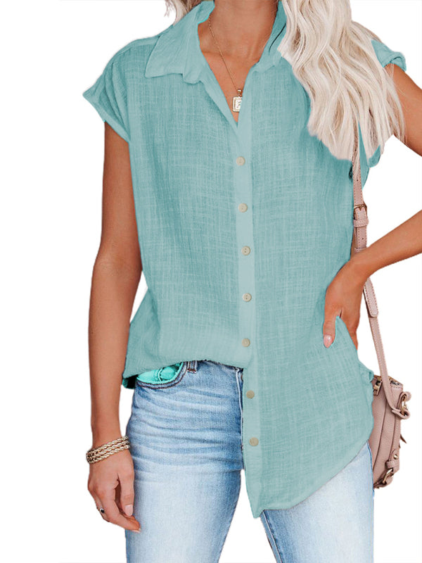 Leinenbluse mit Reverskragen, Knopfleiste, Raglanärmeln und abgerundetem Schlitz am Saum 