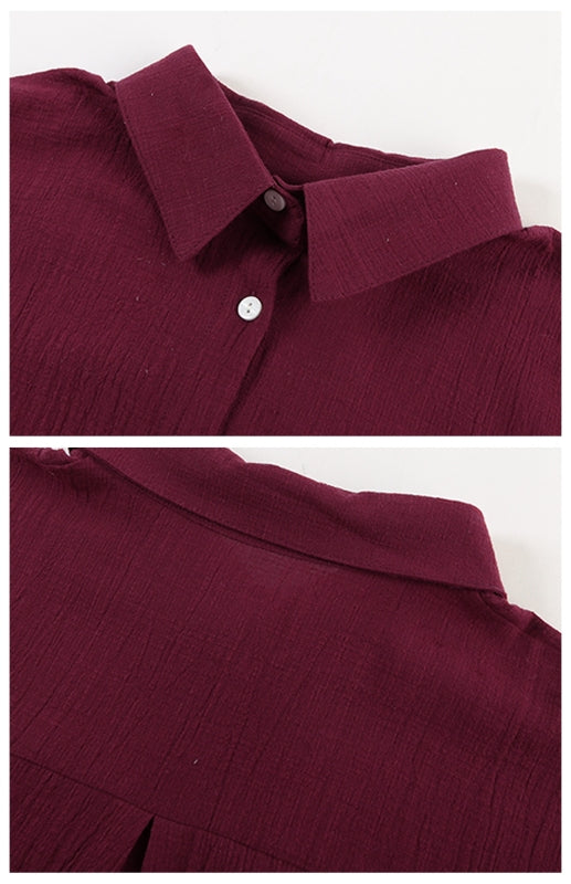 Leinenbluse mit Reverskragen, Knopfleiste, Raglanärmeln und abgerundetem Schlitz am Saum 