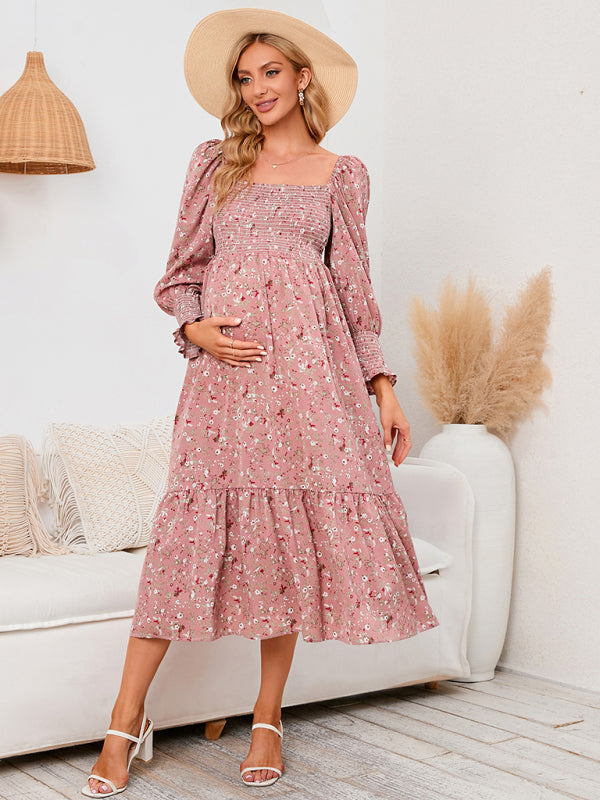 Women's maternity pink floral midi dress with puff sleeves - front view